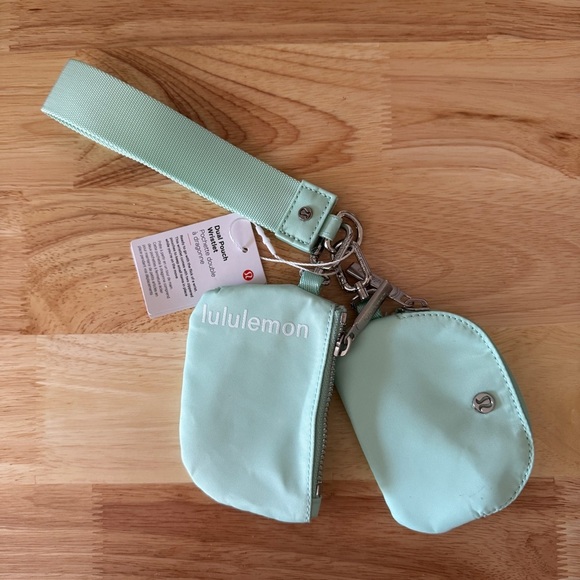 NWT - Lululemon Dual Pouch Wristlet in Mint Green with Logo Hardware - Picture 1 of 9